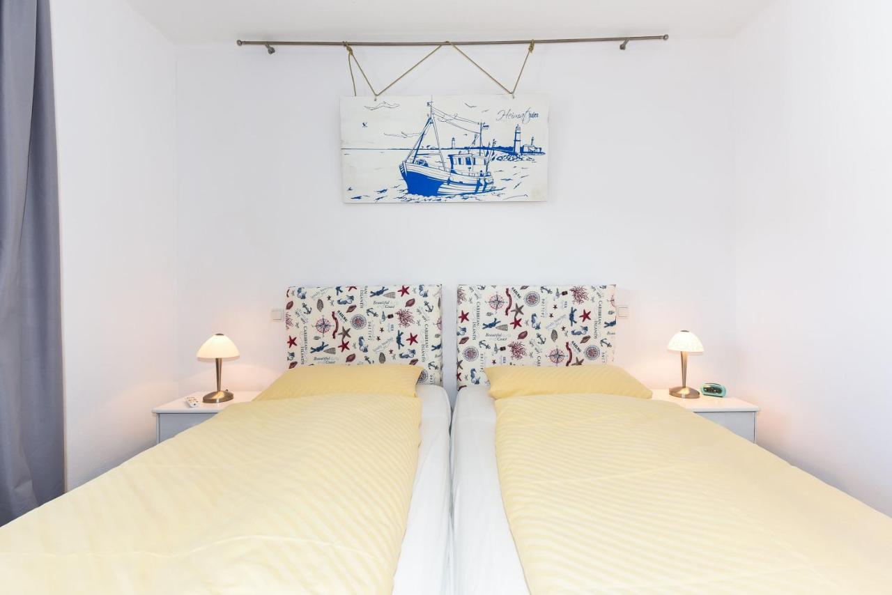 Ferienwohnung To Huus Bensersiel Esterno foto